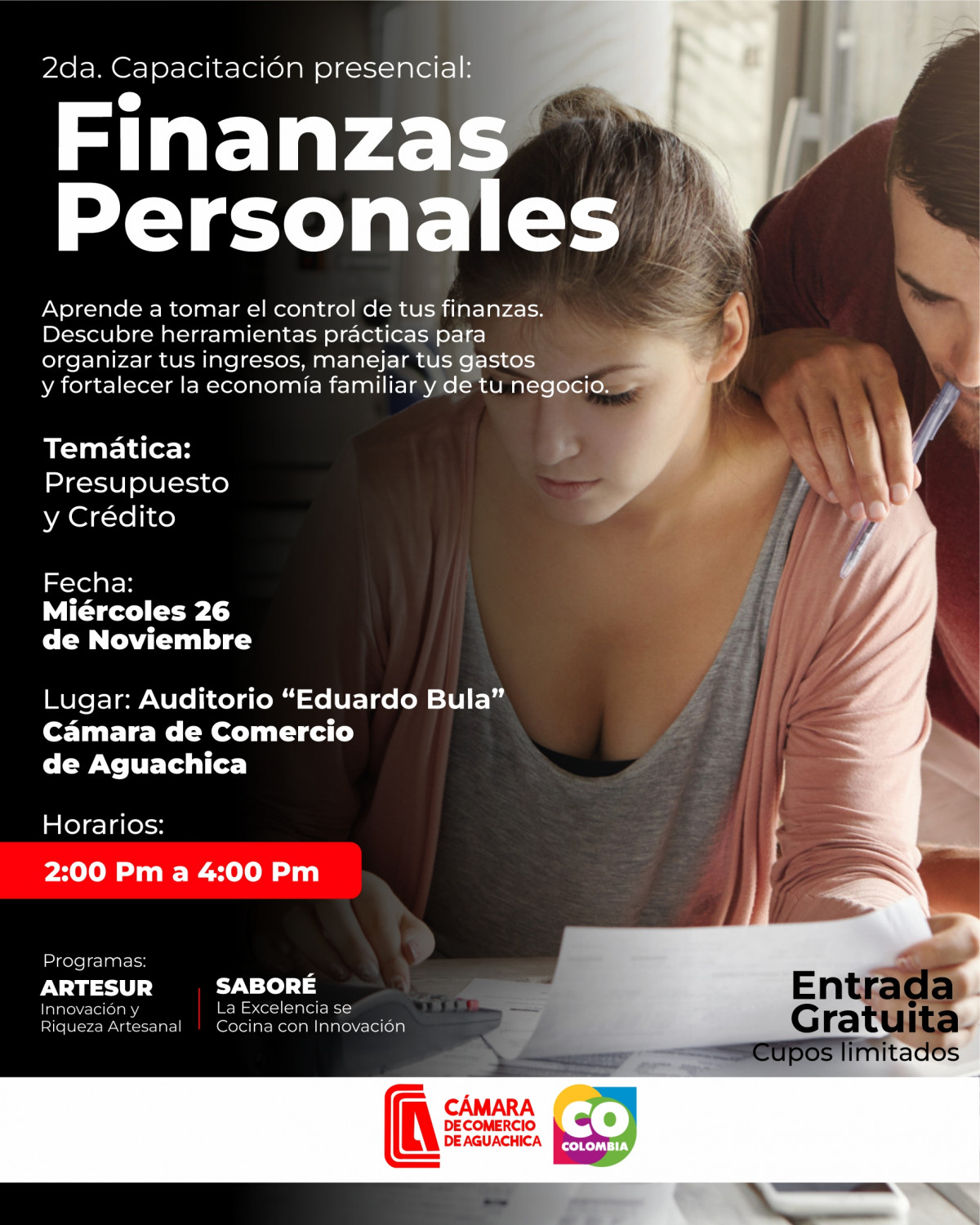 BACKGROUND OF TWO PEOPLE, A WOMAN AND A MAN, REVIEWING DOCUMENTS AND DOING CALCULATIONS